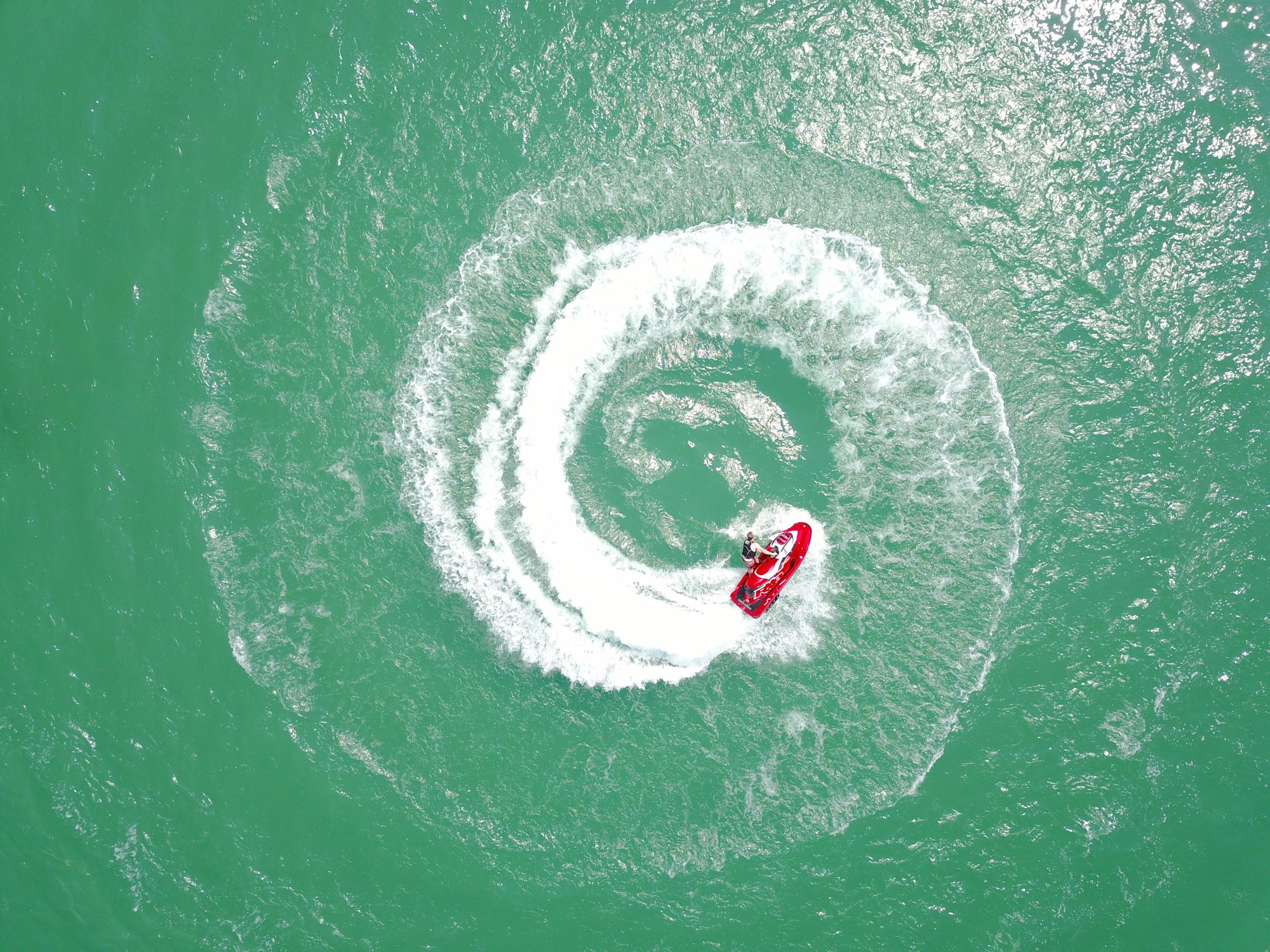 Wanted to see what a spinning jet ski looks like from above! Bear lake has some crazy looking blue water so we thought we would add some action to it.