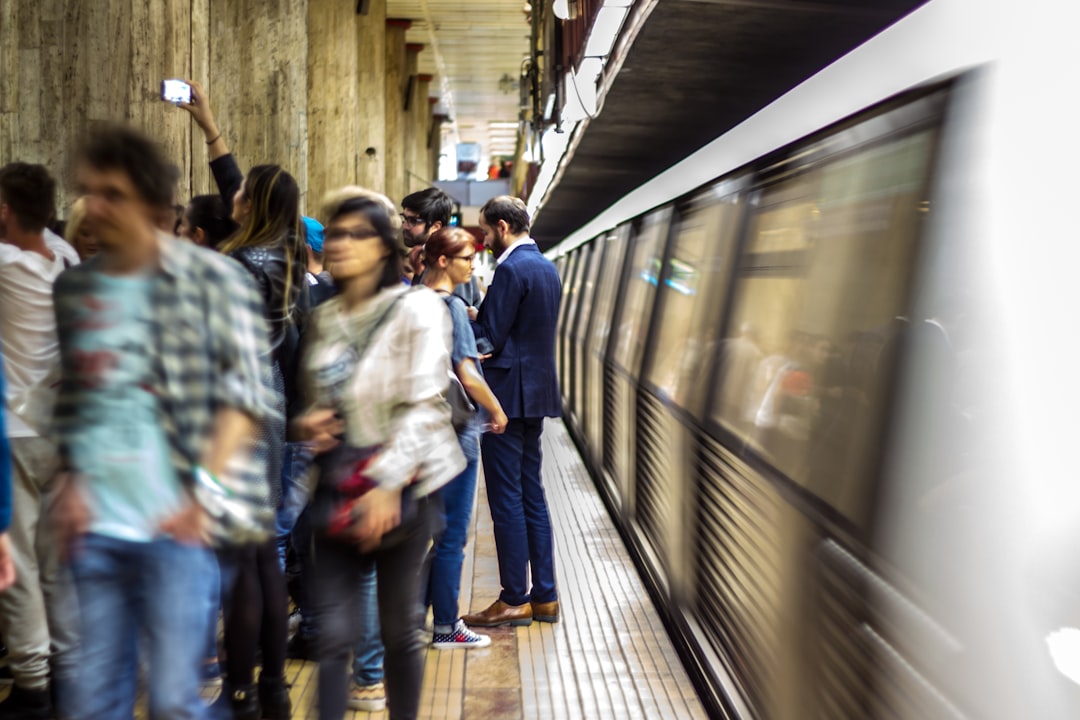 people walking in train station