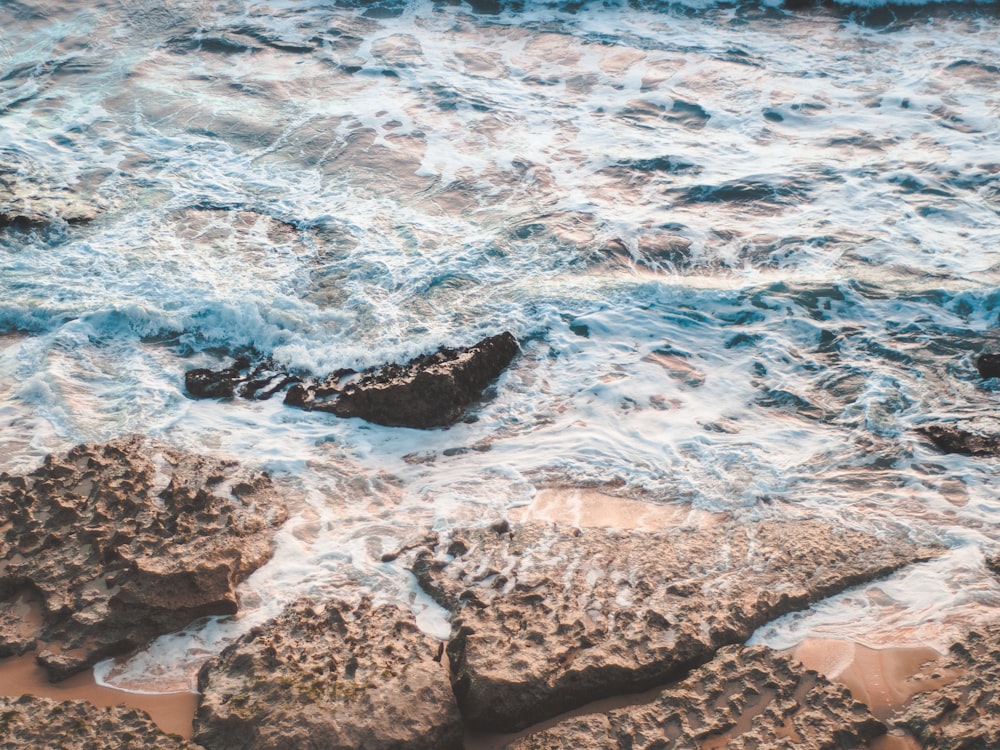 body of water and rocks