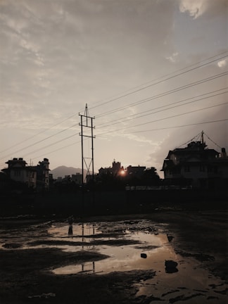 Magnetic field visualization over a residential property at sunset.