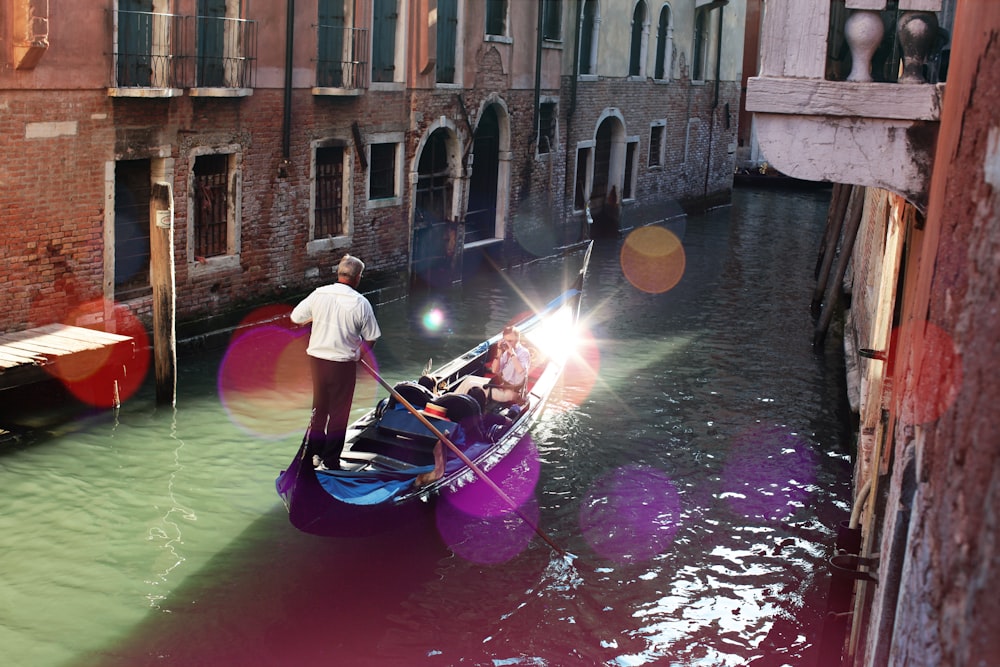 man riding boat