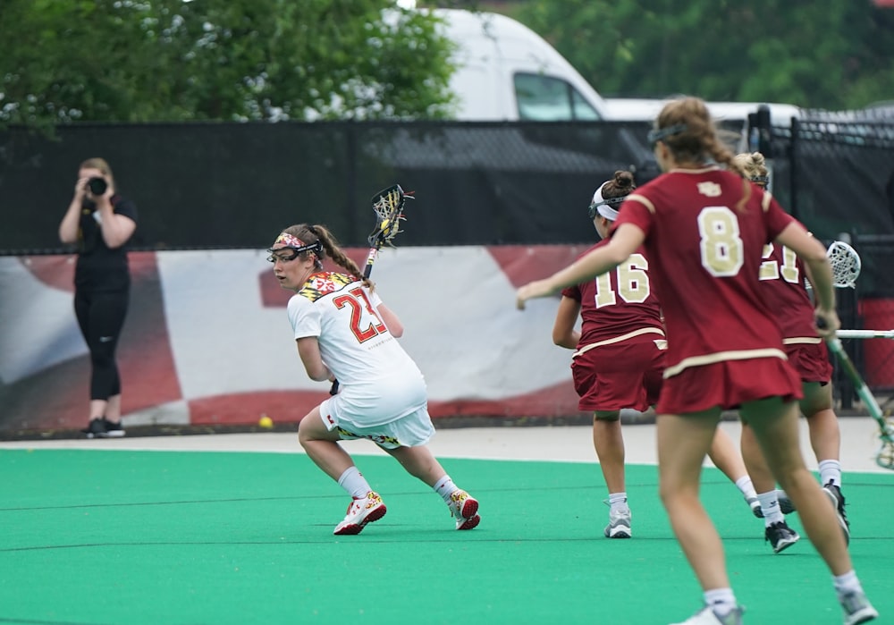 woman playing lacrosse game