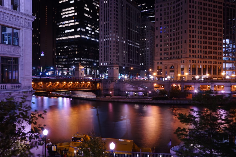 a view of a city at night from across the river