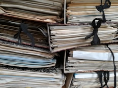 paperwork, mess, folders, chaos, overwhelmed, piles, bulging cupboards, dusty, clutter, study, house