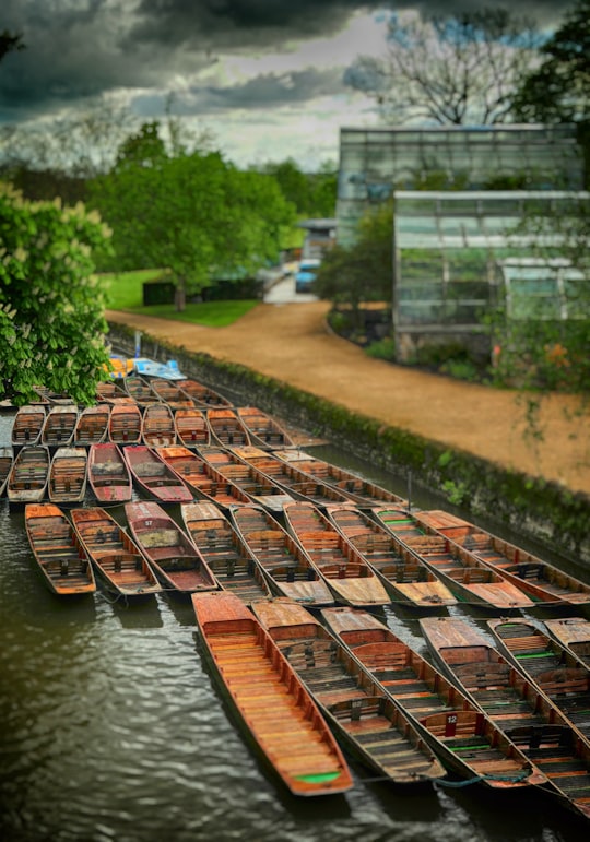 brown wooden canoe near building in Oxford United Kingdom