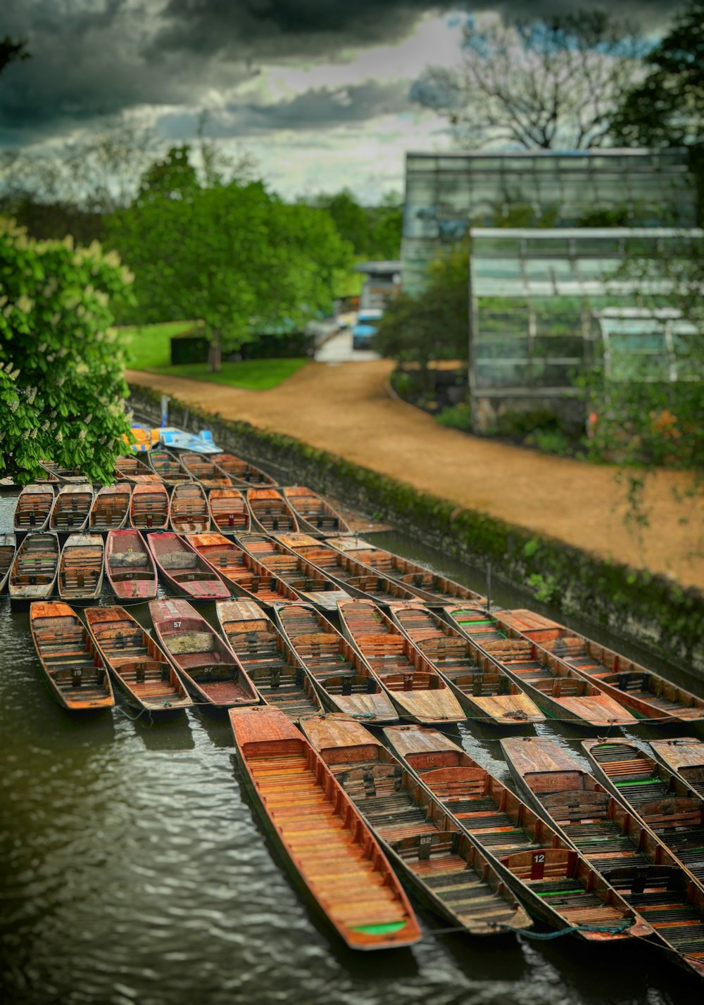 brown wooden canoe near building