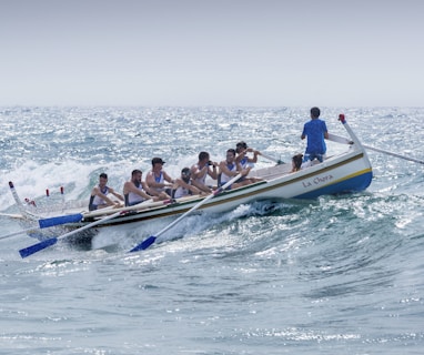 group of men riding boat