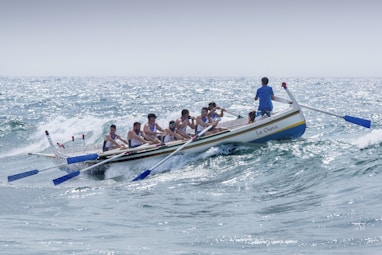 group of men riding boat