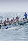 group of men riding boat