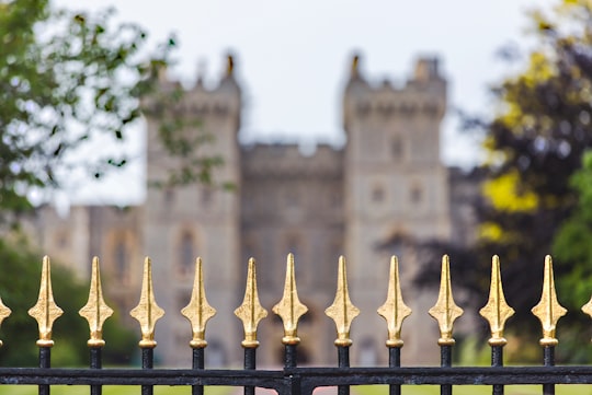 black metal fence in front of mansion in Windsor United Kingdom