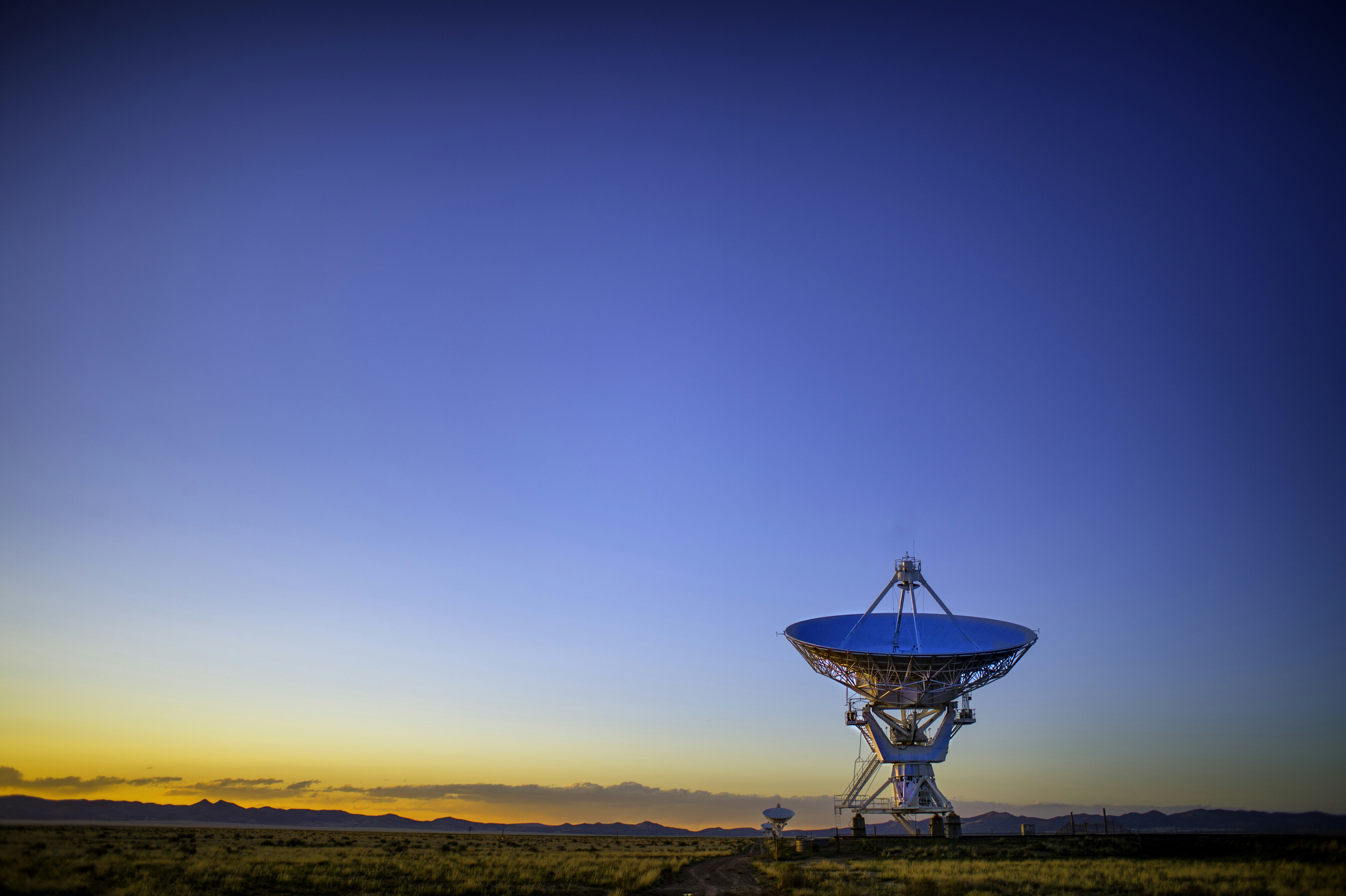 satellite ground station dishes pointing skyward