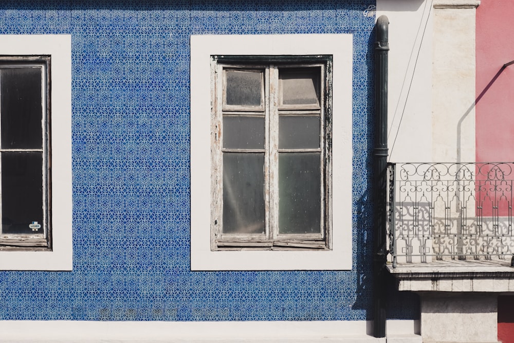 white and blue concrete building during daytime