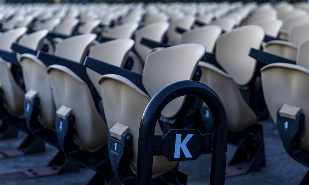 a row of chairs with the letters k on them