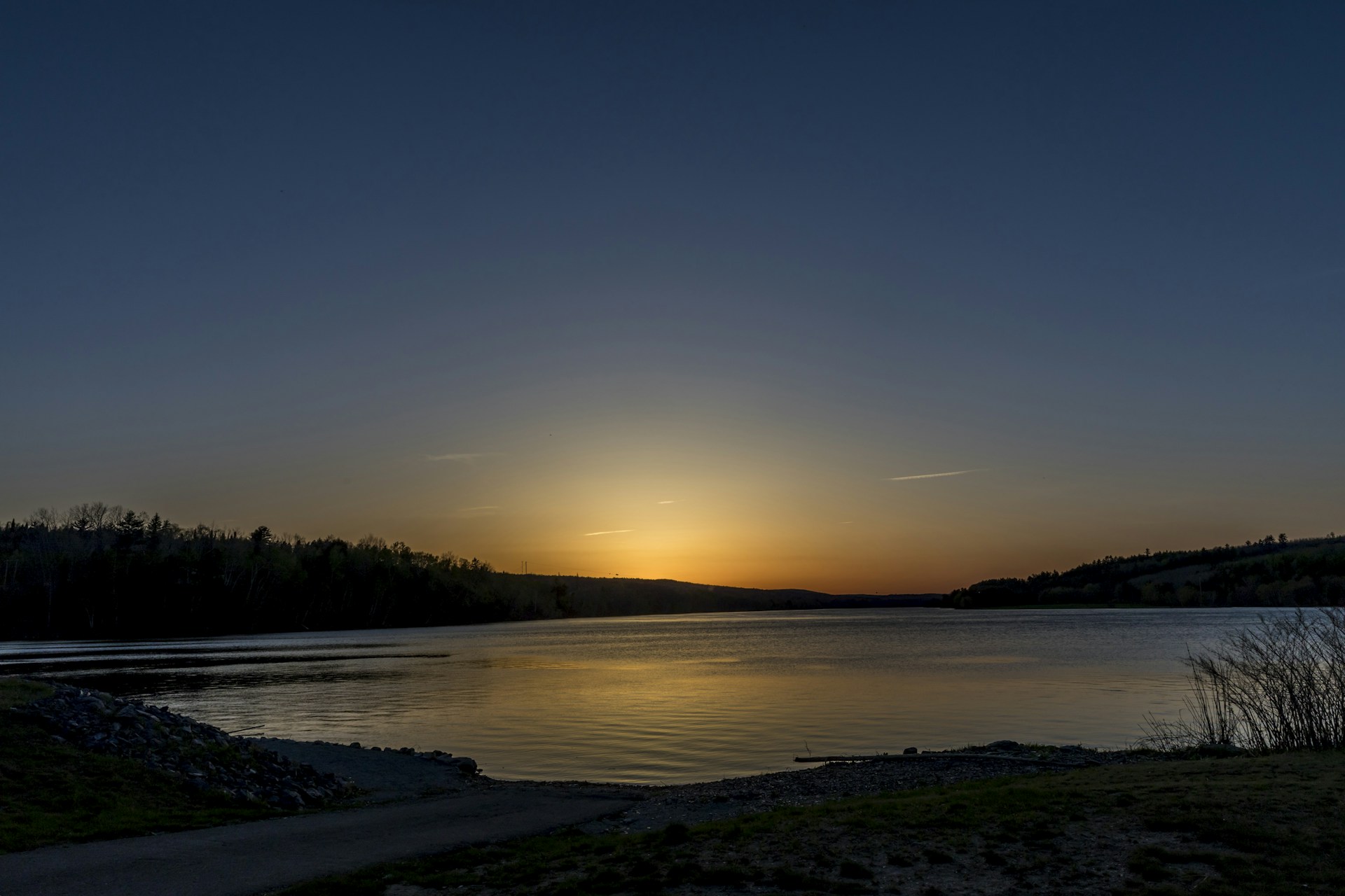 woman wearing yellow long-sleeved dress under white clouds and blue sky during daytime