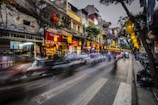 time lapse photography of vehicle towards pedestrian lane