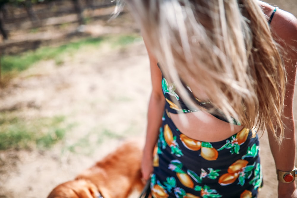 selective focus photo of woman wearing floral brassiere