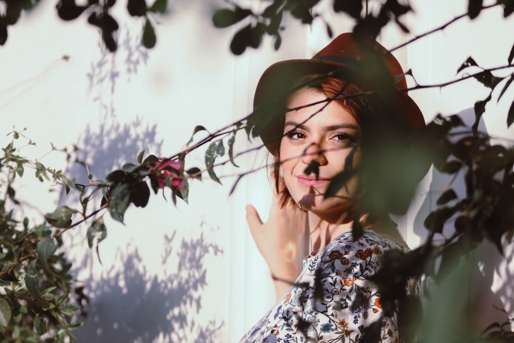 woman posing near trees