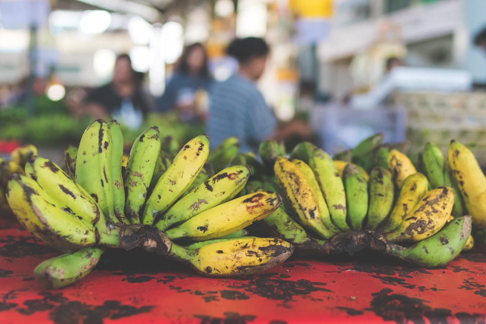 bananas on red surface