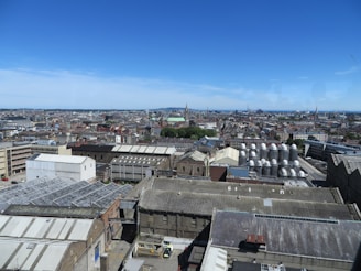 A panoramic view of the combined facilities owned by 1 rhl under a clear blue sky.