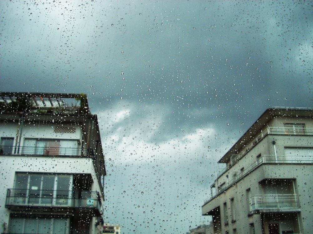 focused photo of glass panel raindrops