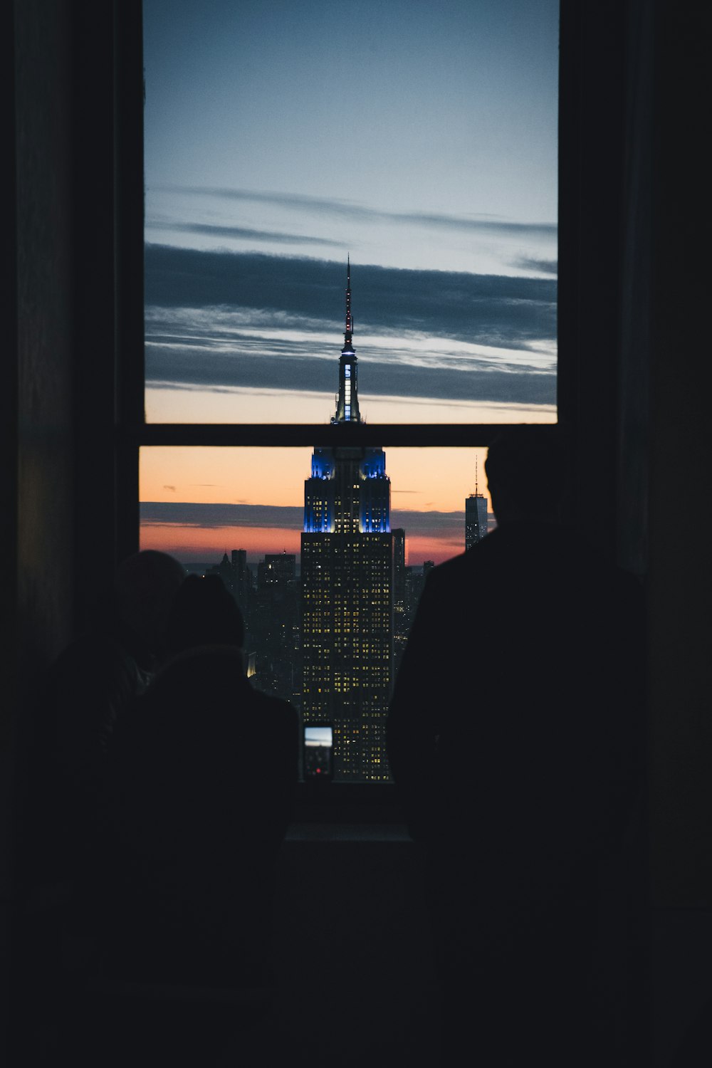 person's looking Empire State Building