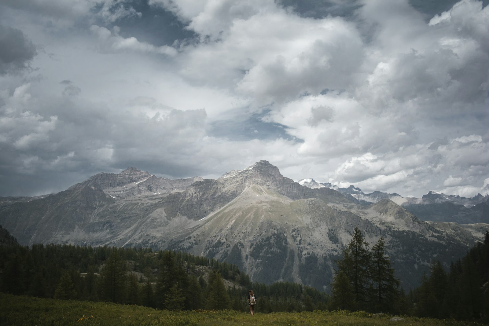 Nikon D7100 + Nikon AF-S DX Nikkor 18-55mm F3.5-5.6G VR sample photo. Mountain under white clouds photography