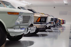 selective focus photography of assorted-color vehicles