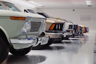 selective focus photography of assorted-color vehicles