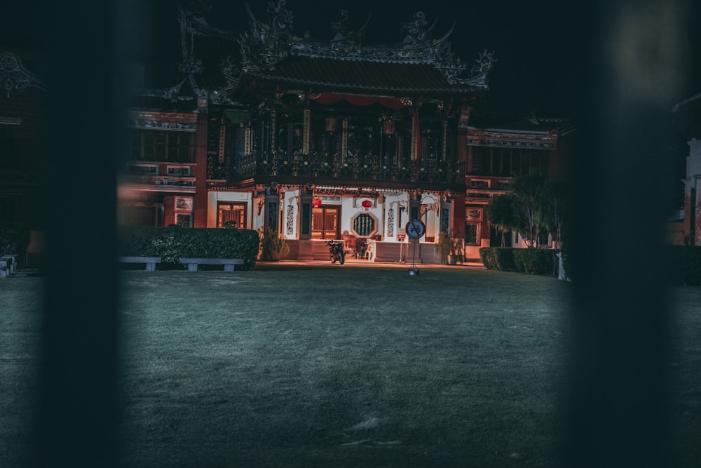 lighted brown temple at nighttime