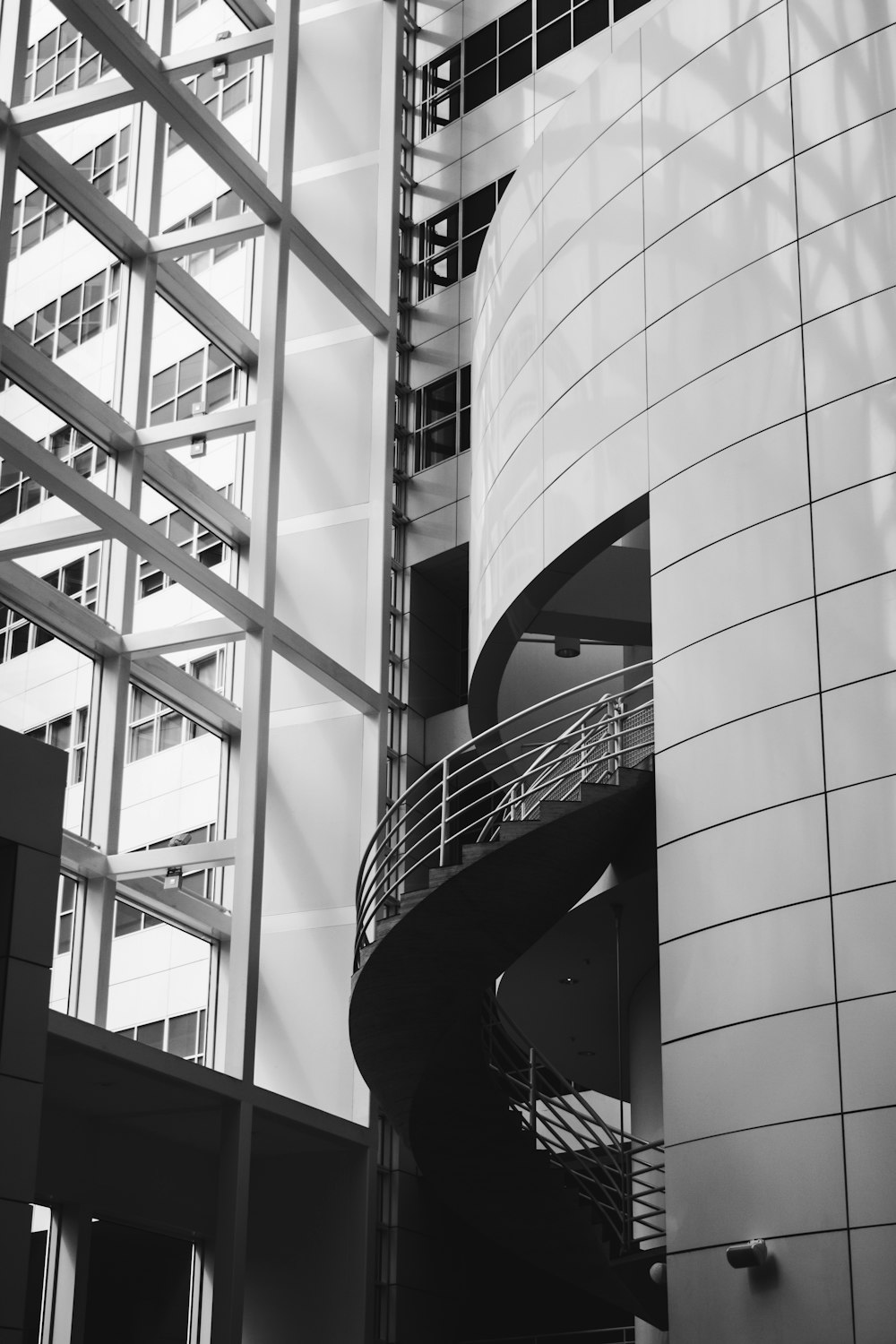 gray spiral stairs of building