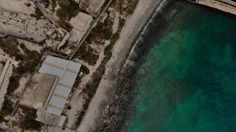 aerial view of buildings and body of water during daytime