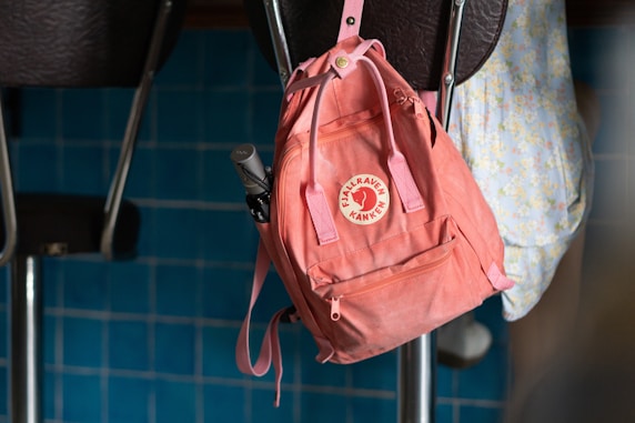 pink and white backpack