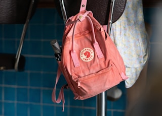 pink and white backpack