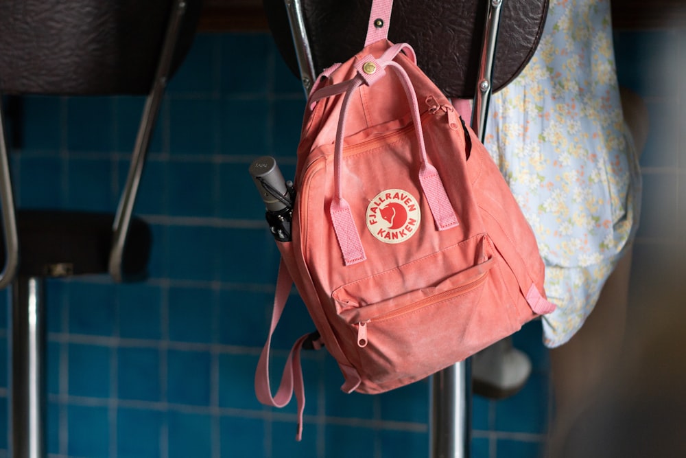 pink and white backpack