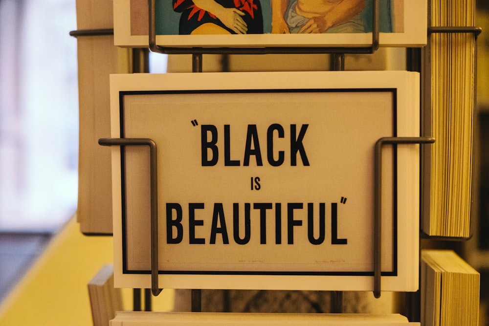 Black is Beautiful card on rack