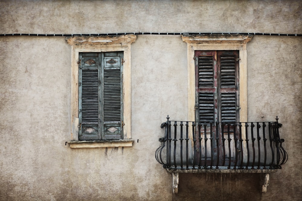 terrace on white painted house near louver window