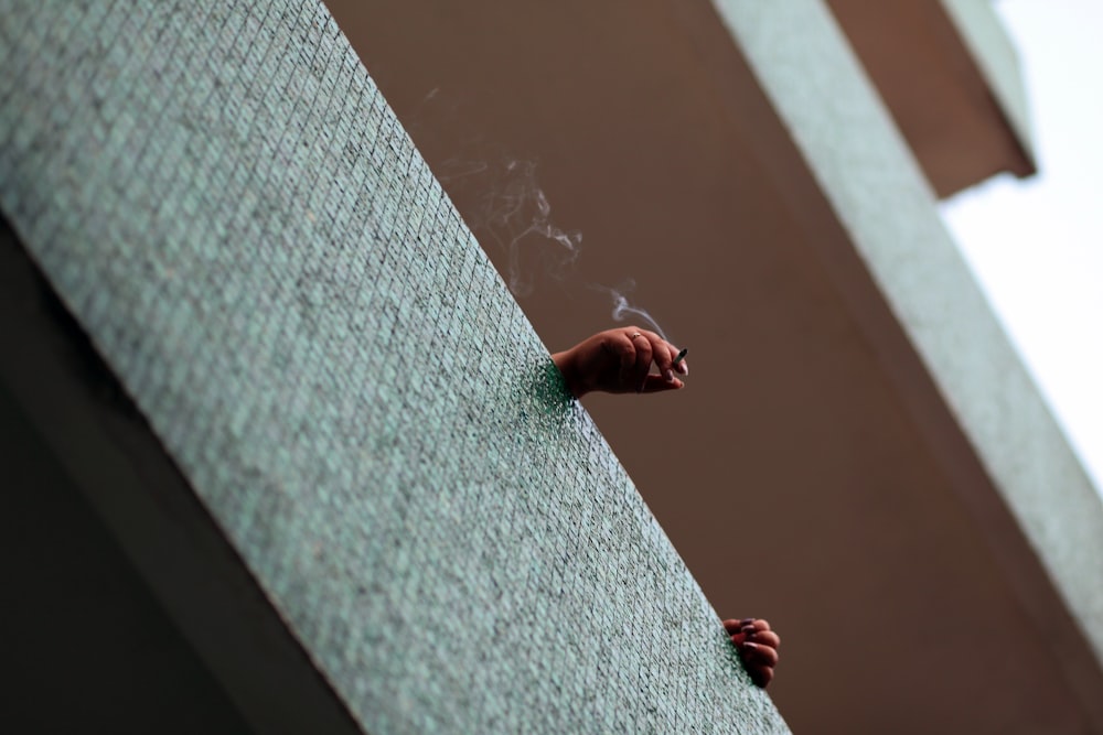 bottom view of person smoking