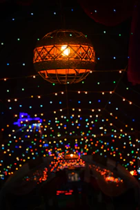 Soft glowing lanterns hanging from the carriage, casting a warm golden light at dusk.