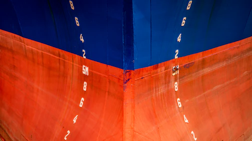 red and blue cruise ship