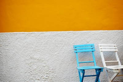 Empty chairs arranged for a group therapy session