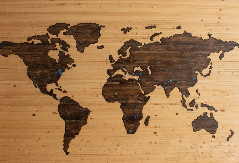 World map with blue pins