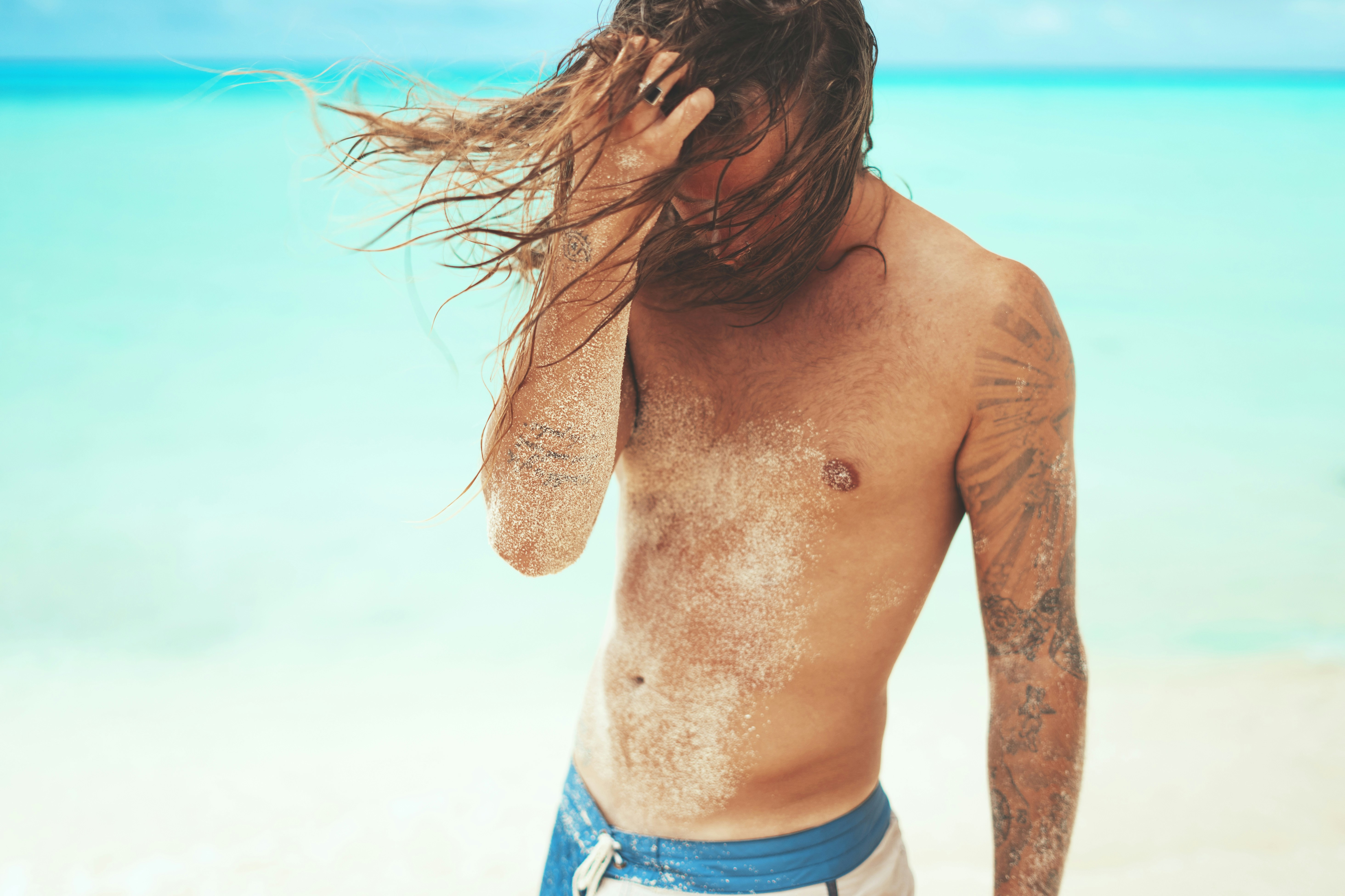 man brushing his hairs