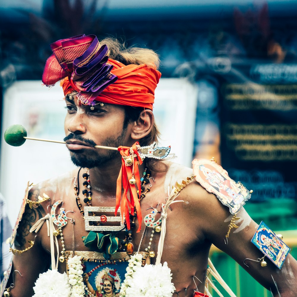 man wearing body piercing lot