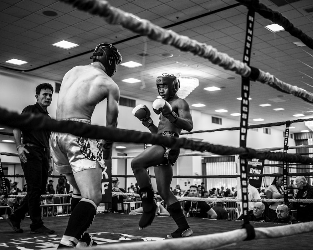 grayscale photo of boxing sparring