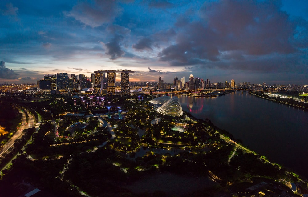 aerial photo of city buildings under cloudy sky