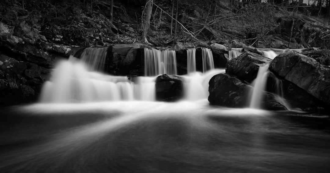 time lapse photography of cascading waterfalls