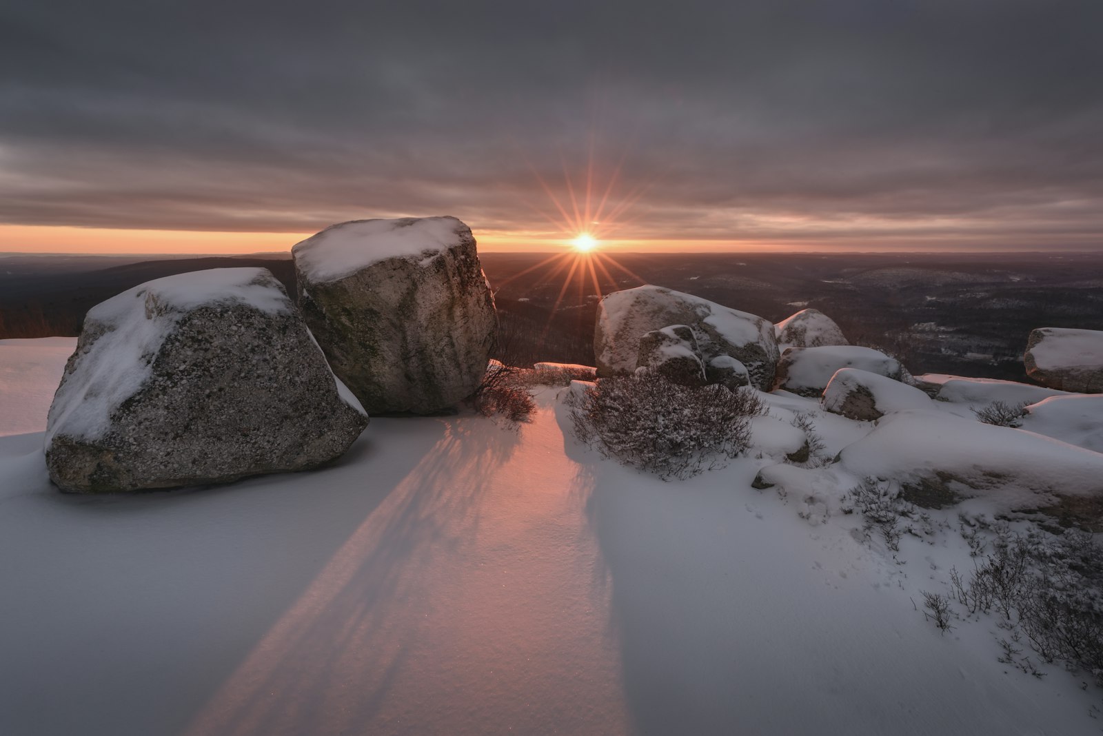 Nikon D810 + Nikon AF-S Nikkor 14-24mm F2.8G ED sample photo. Snow covered rocks against photography