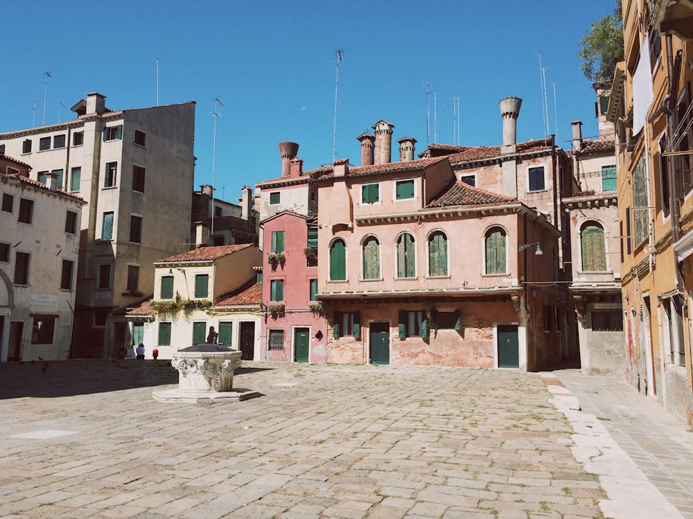 person in front of buildings