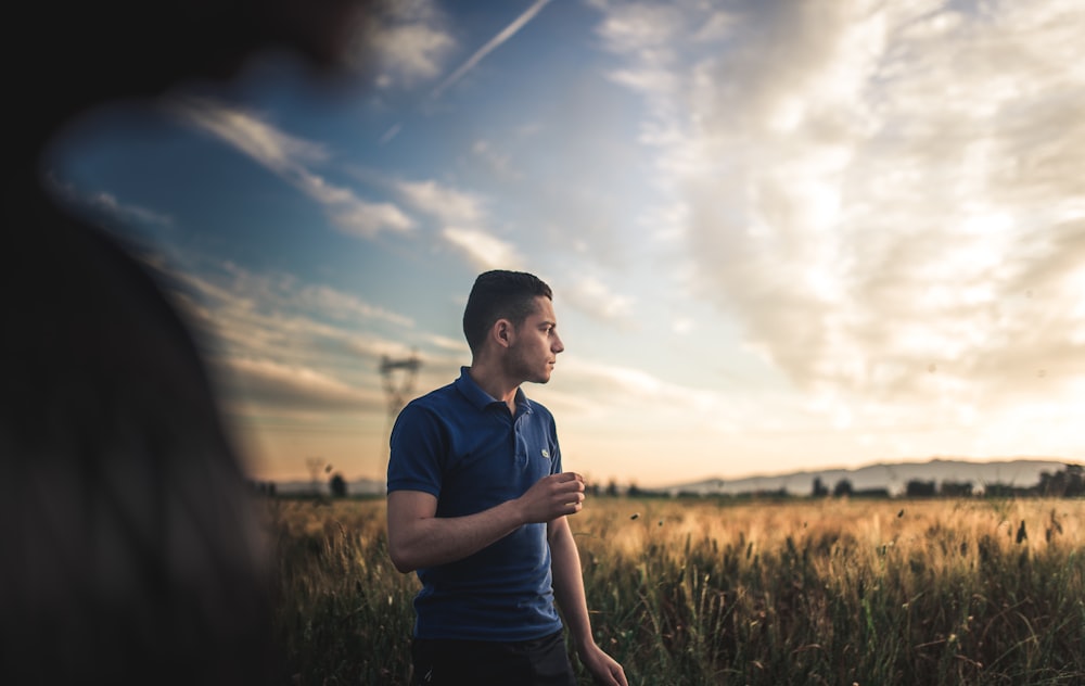 man wearing blue polo shirt