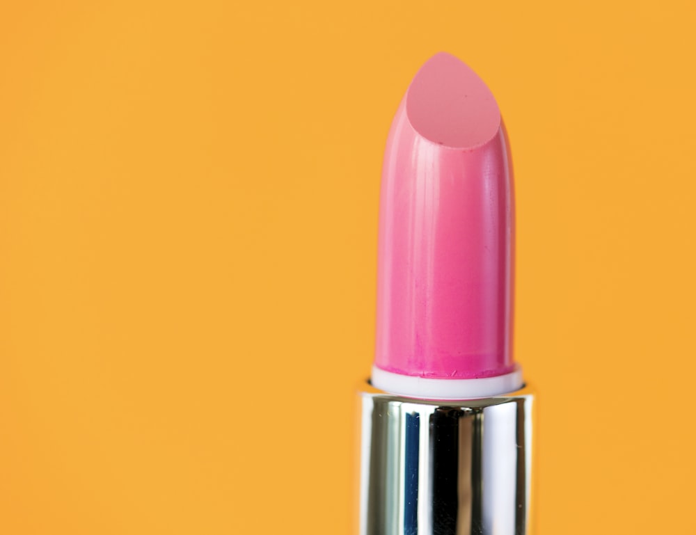 pink lipstick on yellow background